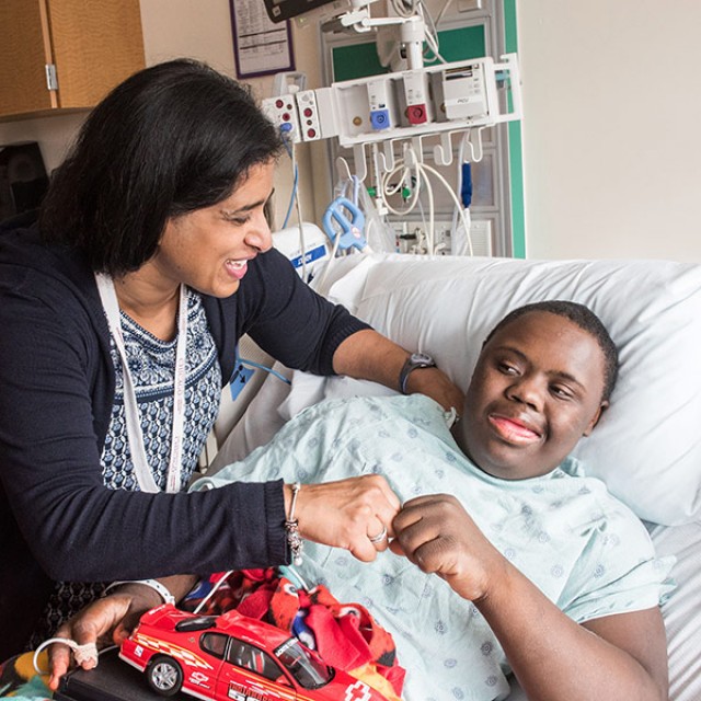 Neethi Pinto, MD, MS, with patient Kyjuan Hudson