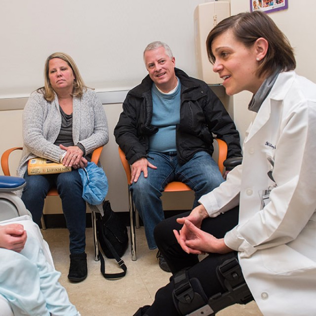 Patient Maeve O’Grady and her parents meet with Hilary Jericho, MD