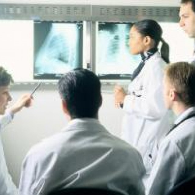Doctors analyzing a scan