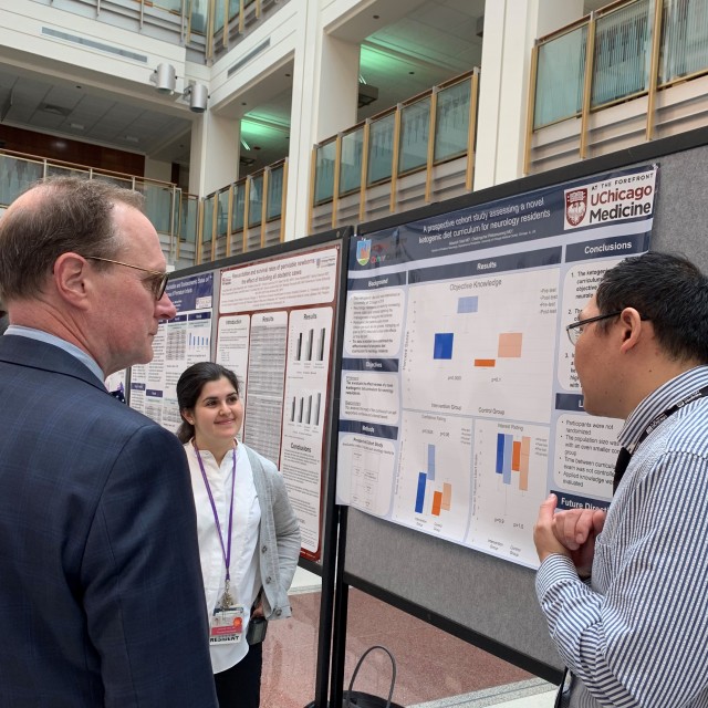Doctors and researchers at research day